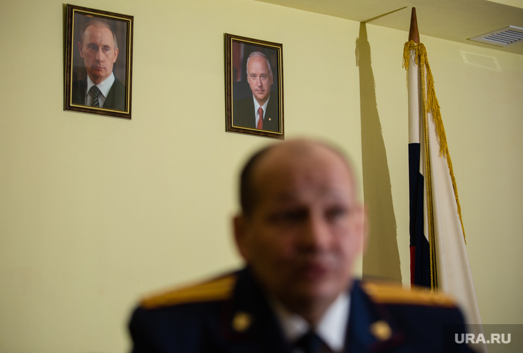 Портреты Владимира Путина и Александра Бастрыкина в кабинете Анвара Ахмедзянова