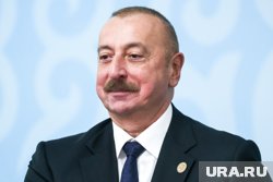 Маркова уличали в излишней поддержке Ильхама Алиева (на фото)