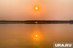 У водохранилища дежурит охрана и никого не пускает к водоему