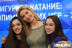 Евгения Медведева, Этери Тутберидзе и Алина Загитова на Олимпиаде 2018 