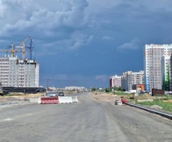 Новый асфальт укладывают у школы №52