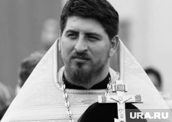 Путин посмертно наградил священника Савченко
