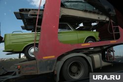 С автовоза упал едкий Porsche 911 за пять миллионов долларов