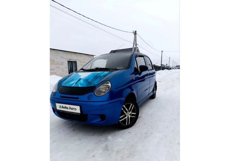 Хозин нанес на капот машины изображение