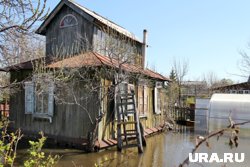 Люди уверены, что дома топит из-за засыпки ручья (архивное фото) 