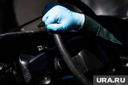 Тело мужчины нашли в служебном автомобиле