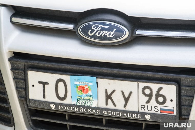 Автолюбители стирают или закрывают часть символов на номерах