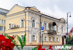 Дом был известен магазинами фото-заведениями