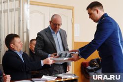 Адвокаты и прокуратура обсуждают фотографии из дела Дубова и Урюпина