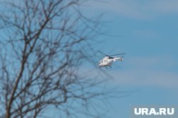 Пилоты вертолета готовятся к завтрашним учениям у филармонии (архивное фото)