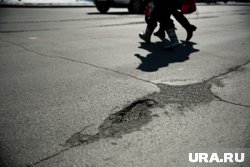 Женщина переходила дорогу в неположенном месте