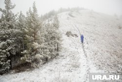 Женщина не смогла спуститься с горы из-за метели (фото из архива)