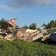 В Брянской области из-за подрыва моста поезд сошел с рельсов и погибли люди. Фоторепортаж