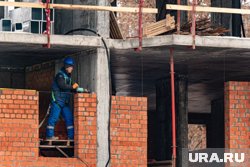 Путин поручил разработать меры по снижению рисков для банкротства застройщиков
