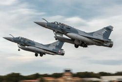Новую операцию НАТО поддерживают треть стран-участниц