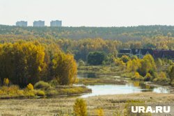 Пятно в реку Миасс попало с гаражного кооператива 