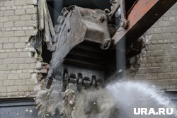 Необходимость демонтажа здания обусловлена расширением улицы Попова