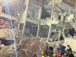 Последствие удара по жилому району Тегерана