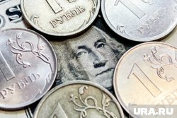 Курс доллара впервые опустился до 84 рублей с лета 2024 года