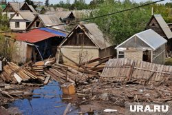 Вода начинает подтапливать дома в нескольких районах. (Фото архивное)