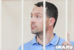 Владимир Атаманченко, находясь под следствием, судится с бывшим работодателем