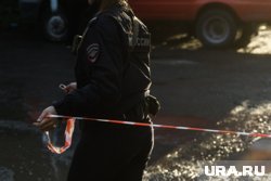 Подъезд дома, где произошло убийство, оцепили
