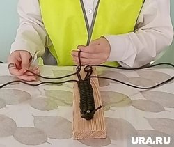 Браслет из паракорда за мгновение превращается в пятиметровую веревку