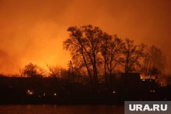 Перед пожаром очевидцы слышали не менее десяти взрывов (архивное фото) 