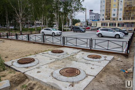Открытая парковка НСД. Нижневартовск., парковка, люки