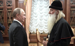 Президент России Владимир Путин и глава старообрядческой церкви митрополит Корнилий