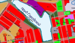 Фиолетовым цветом выделена зона крупных спортивных сооружений, красным — общественно-деловая зона, зеленым — зона общего пользования