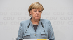 Меркель руководит партией 18 лет