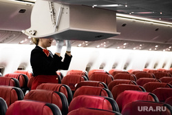 Флагманский самолет Boeing 777-300ER авиакомпании «AZUR air». Екатеринбург, воздушное судно, бортпроводник, пассажирский самолет, ручная кладь, самолет, стюардесса, авиакресла, борт самолета, авиаперевозки