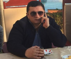 Гули говорил по телефону, когда пришел киллер