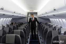 Подготовка рейса авиакомпании Red Wings Екатеринбург-Саратов. Екатеринбург, бортпроводник, салон самолета, сухой суперджет, самолет, стюардесса, ssj100, sukhoi superjet100, ssj100-95b