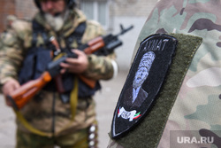 The work of the Chechen volunteer battalion Akhmat in Mariupol.  Ukraine, Chechens, fight, fighter, fighting, warrior, army, donbass, stripe, war, chevron, military, patrolling, cleansing, Akhmat, soldier, SVO, Kadyrovtsy