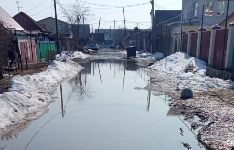 Затопленная улица Попова, которая по документам уже отремонтирована