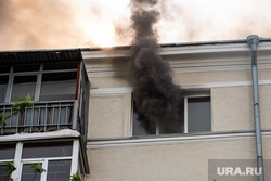A fire in a multi-storey residential building on Sheinkman Street.  Yekaterinburg, smoke, residential building, fire, apartment, ignition