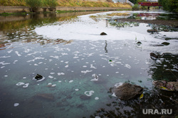 Colored water at the embassy.  Ekaterinburg, environmental pollution, Iset river, emissions, sewage discharge, ecology