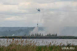 Последствия пожара в селе Шайдуриха. Свердловская область, тушение с вертолета, аятское водохранилище