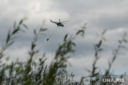 Последствия пожара в селе Шайдуриха. Свердловская область, тушение пожара, военный вертолет