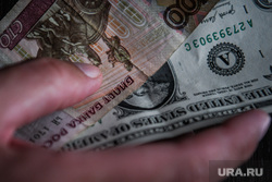 Экономист назвал два условия для снижения курса доллара до 60 рублей