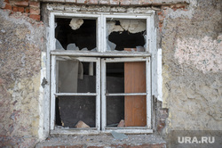 Views of the city.  Perm, broken window, abandoned
