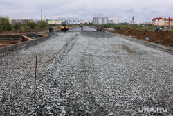 Стройки в Заозерном. Курган, щебень, дорога, 16 микрорайон, заозерный