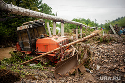 Flood in Nizhny Sergi.  Sverdlovsk region, bulldozer, flood, destruction, mudflow