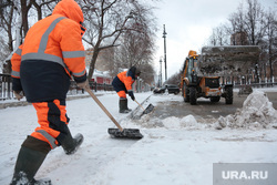 Clearing snow on city streets.  Perm, snow removal, road cleaning