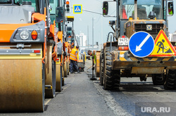 Road construction. Chelyabinsk, skating rink, road construction, road work, asphalt laying, road construction, detour sign, road, road workers
