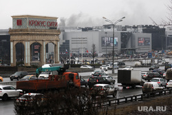 Крокус сити холл днем после террористического акта. Мемориал по погибшим в Крокус сити холле. Москва, крокус сити холл